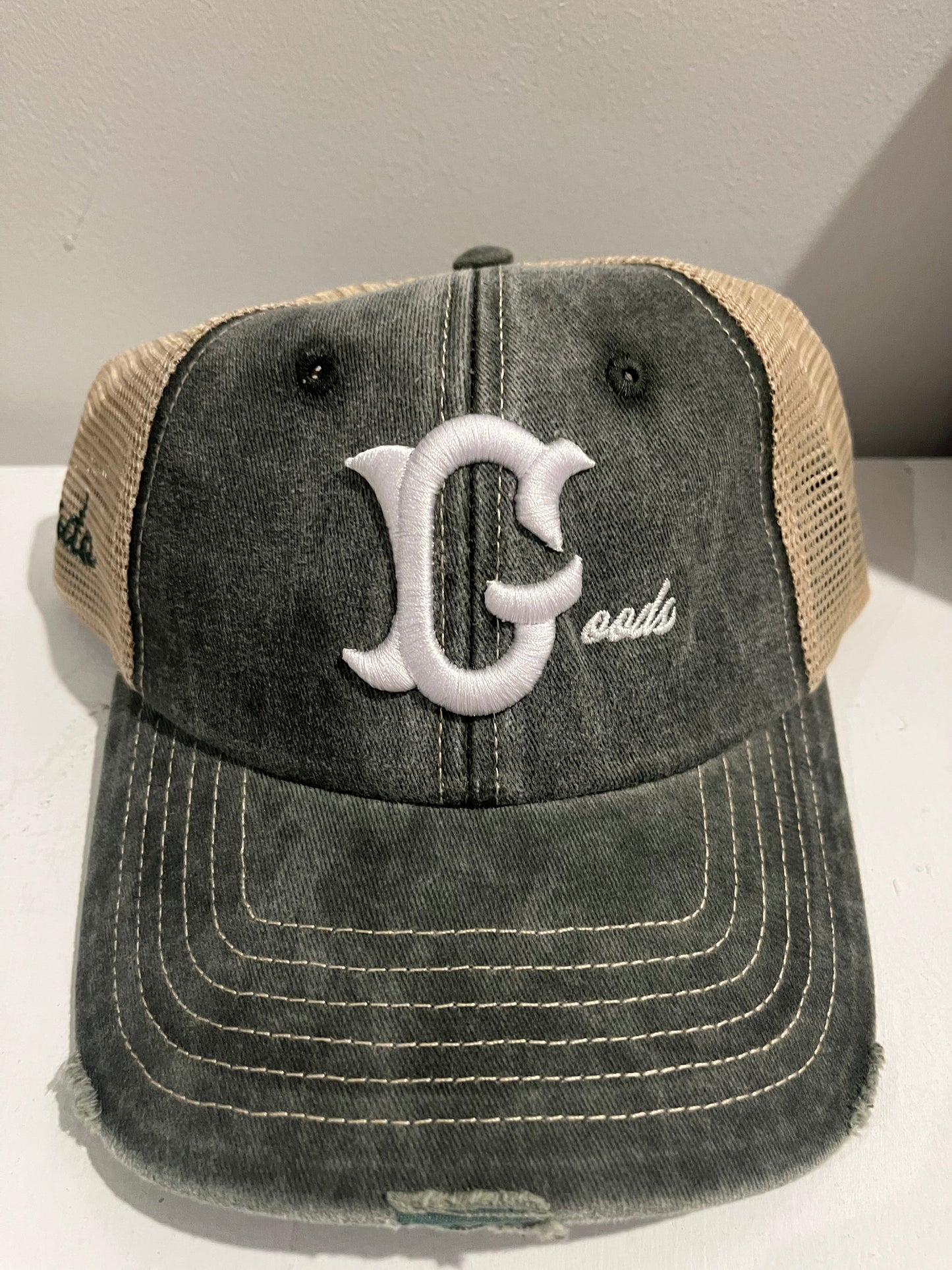 DISTRESSED GOODS CAP